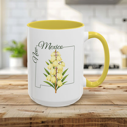 15oz white ceramic mug with yellow interior/handle, New Mexico Yucca flower, and state outline.