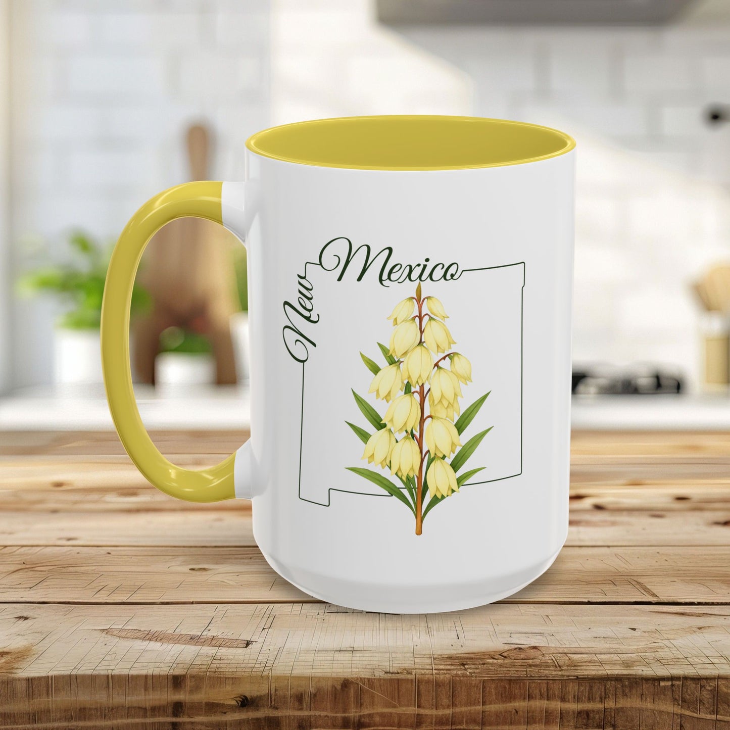 White ceramic mug with yellow interior and handle, featuring a New Mexico state outline and Yucca flower illustration.