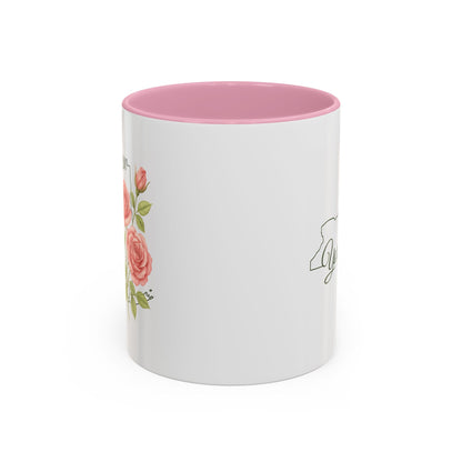 White ceramic mug with pink interior, featuring watercolor roses and a New York state outline.