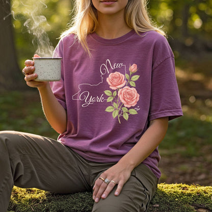 Plum garment-dyed cotton t-shirt with a New York outline and painterly pink roses.