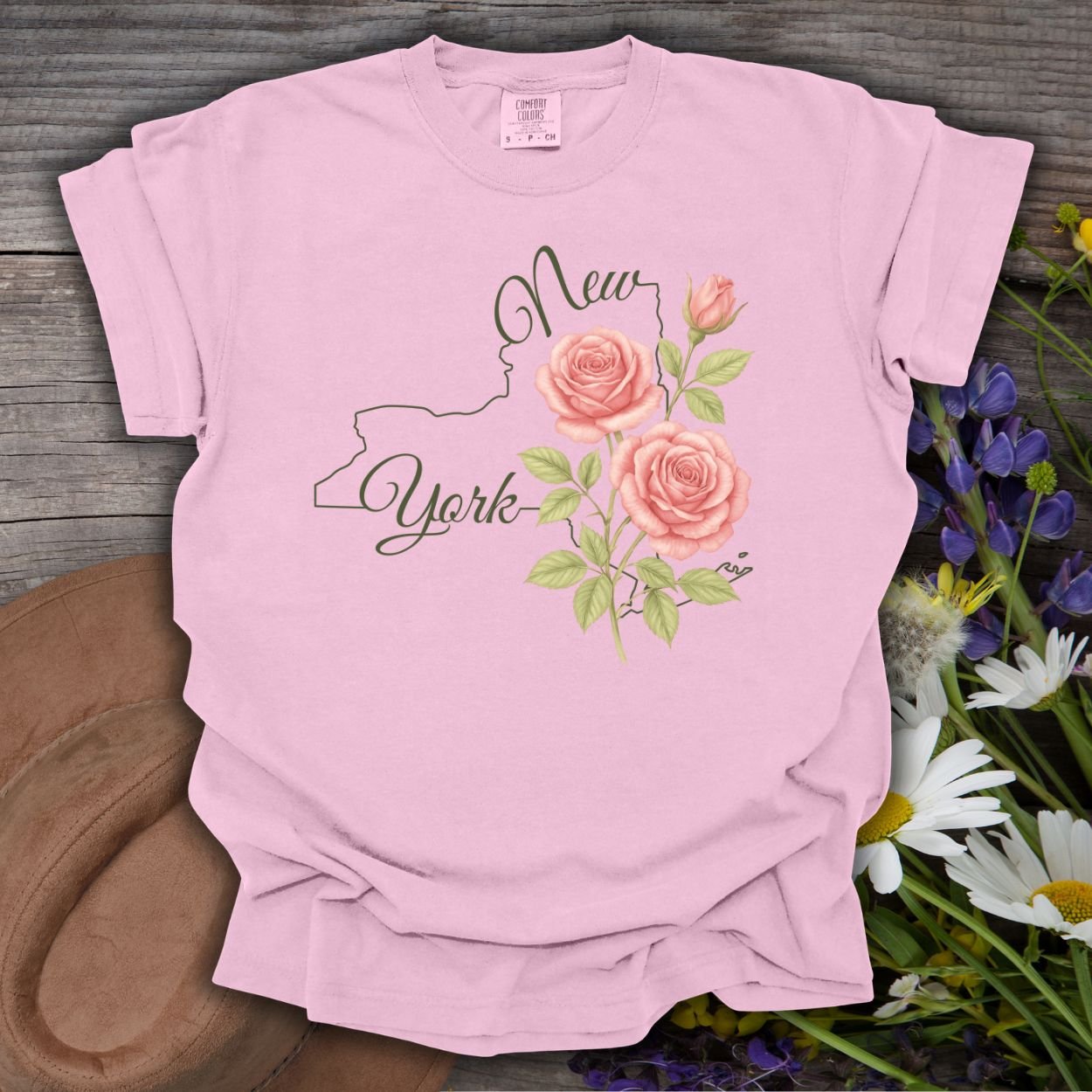 Blossom pink, relaxed-fit, garment-dyed cotton t-shirt with a New York state outline and painterly roses.