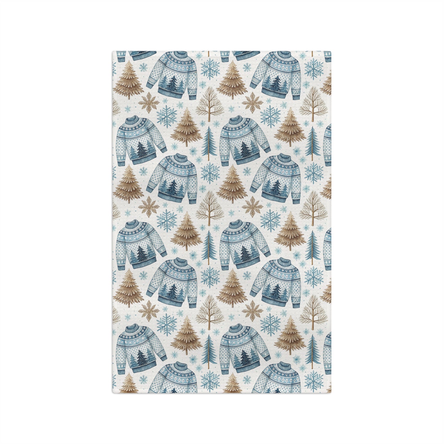 Nordic Fair Isle sweater microfiber tea towel with blue sweaters, pine trees, and snowflakes.