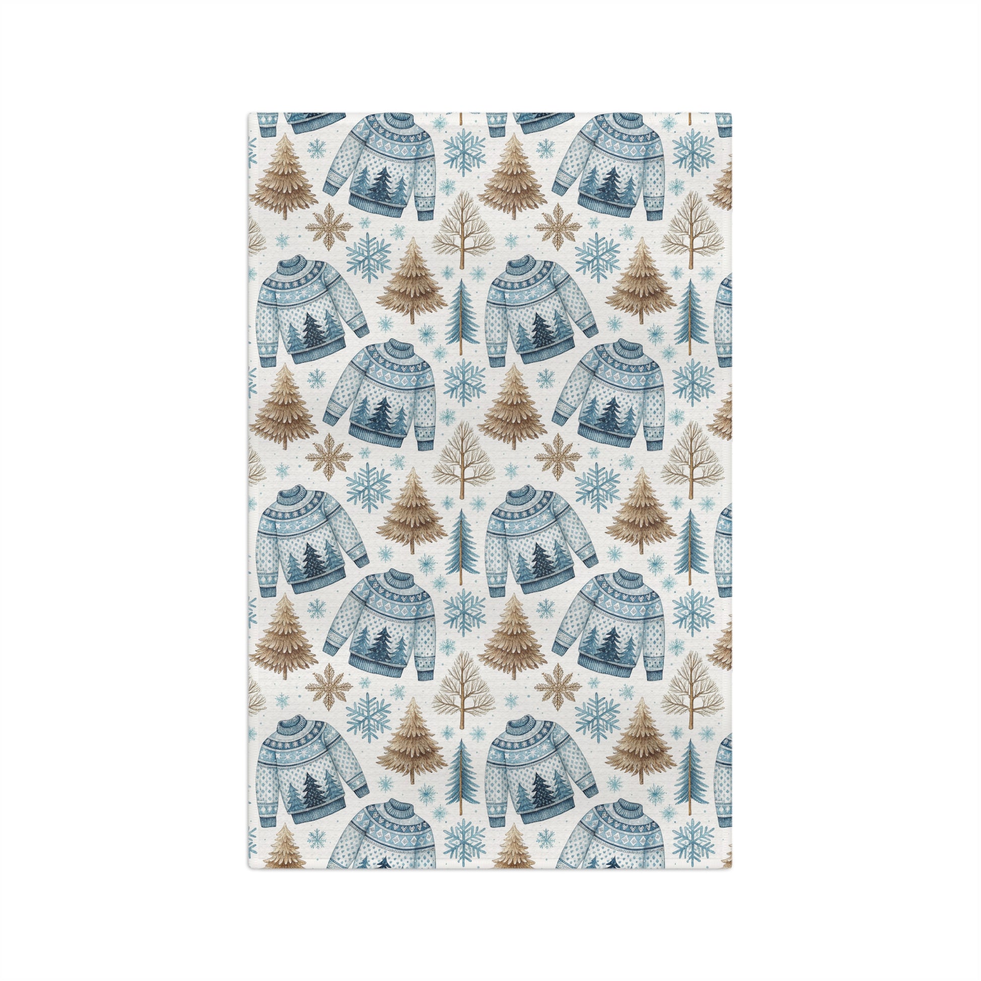 Nordic Fair Isle sweater microfiber tea towel with blue sweaters, pine trees, and snowflakes.
