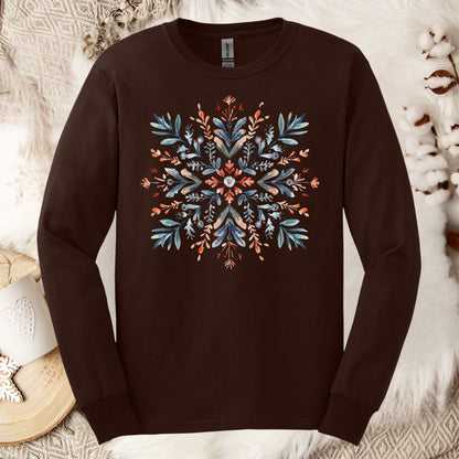 Dark Chocolate Gildan Softstyle long sleeve tee with a watercolor Scandinavian snowflake in red and blue.