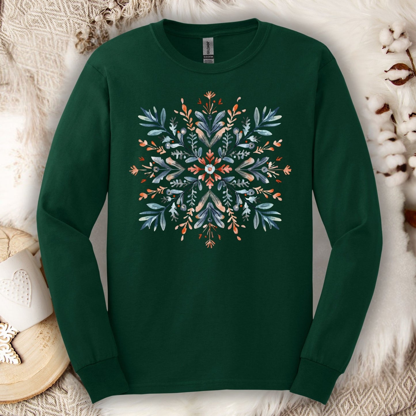 Forest Green Gildan Softstyle long sleeve tee with a watercolor Scandinavian snowflake design.