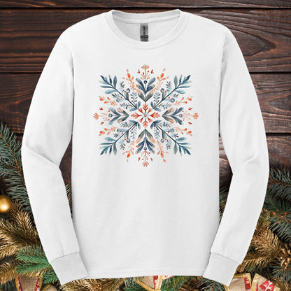 White Gildan Softstyle long sleeve tee with a watercolor Scandinavian snowflake design in red and blue.