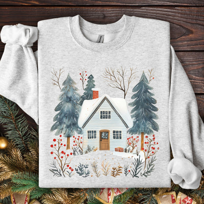 Ash gray crewneck sweatshirt with a snowy Nordic cabin and pine trees design.