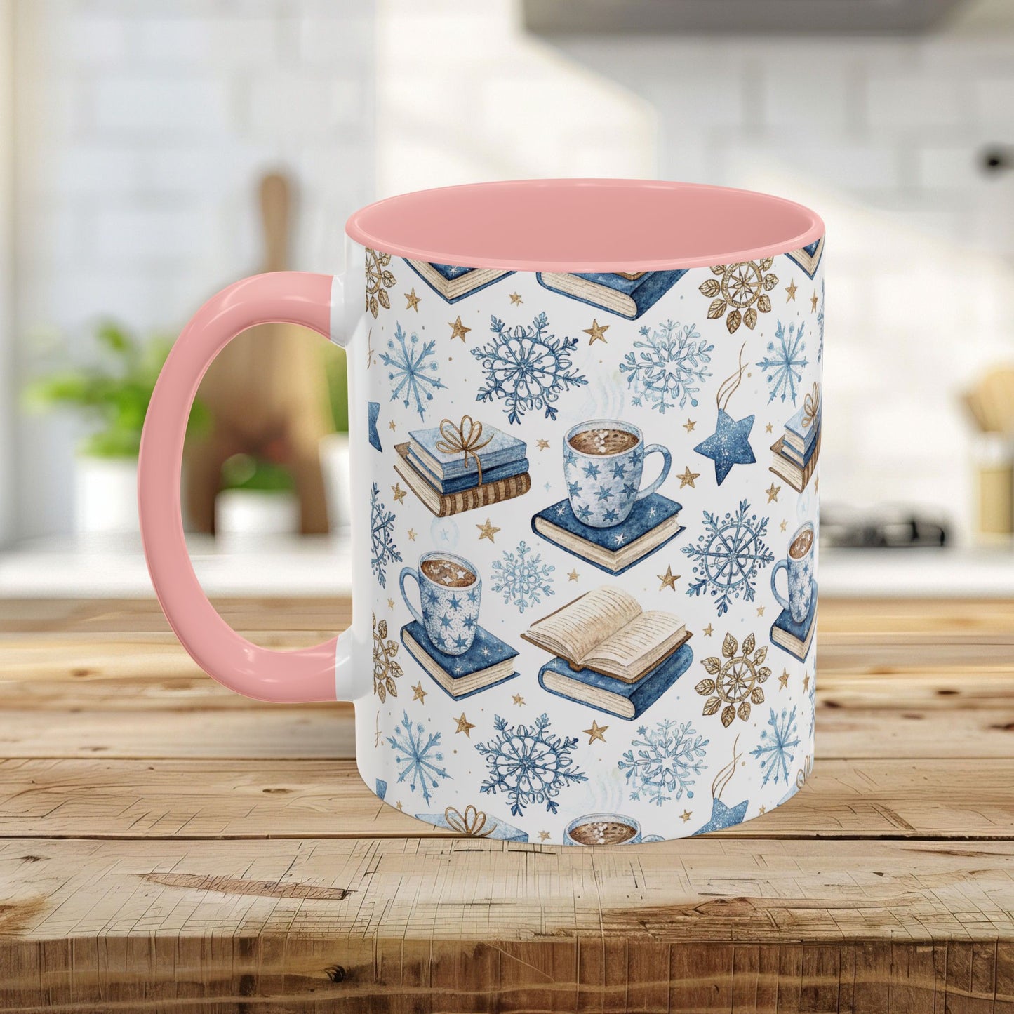 Nordic Winter Cocoa & Books 11oz mug with pink handle/interior, featuring blue snowflakes, books, and cocoa.