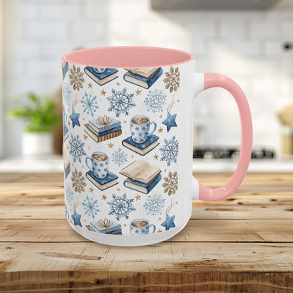 15oz ceramic mug with pink handle/interior, featuring a Nordic winter watercolor of cocoa, books, and snowflakes.