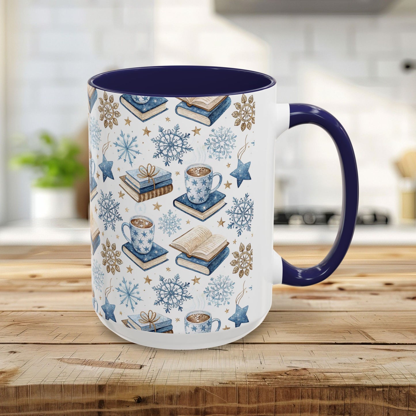 15oz ceramic mug with navy handle/interior, featuring a Nordic winter watercolor of cocoa, books, and snowflakes.