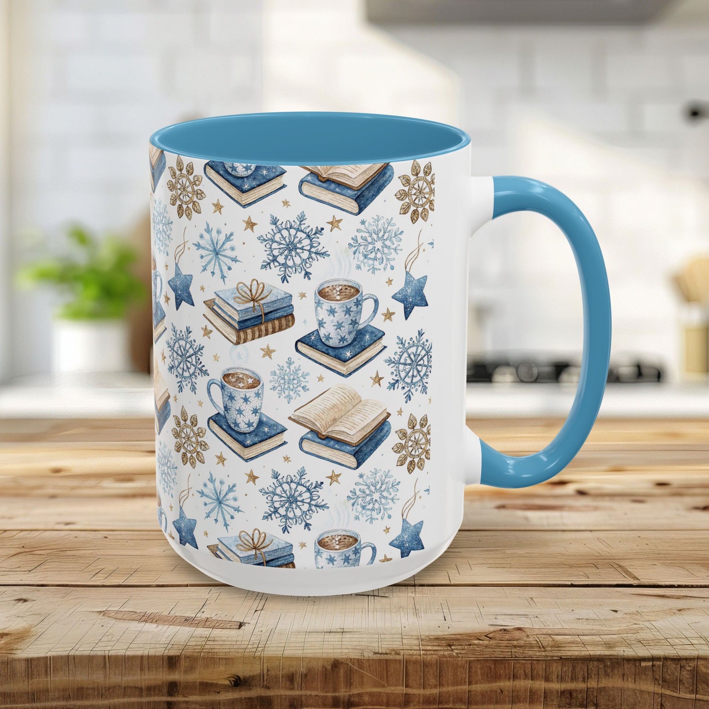 15oz Nordic Winter Cocoa & Books mug with light blue handle/interior, featuring watercolor snowflakes, books, and cocoa.