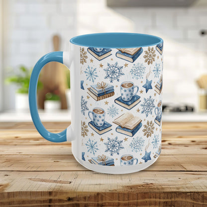 Nordic Winter Cocoa & Books 15 oz. ceramic mug with blue handle and interior, featuring watercolor snowflakes, books, and cocoa.