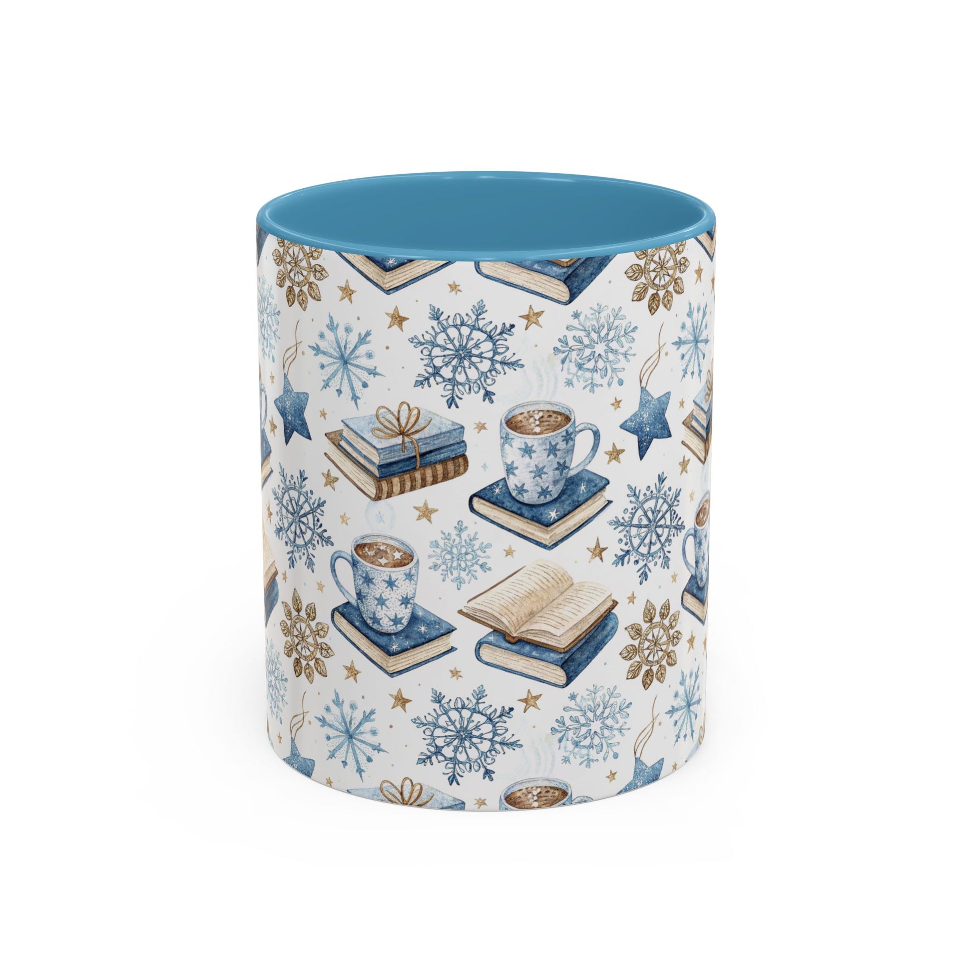 Nordic Winter Cocoa & Books ceramic mug with blue interior, featuring watercolor snowflakes, stars, and stacked books.
