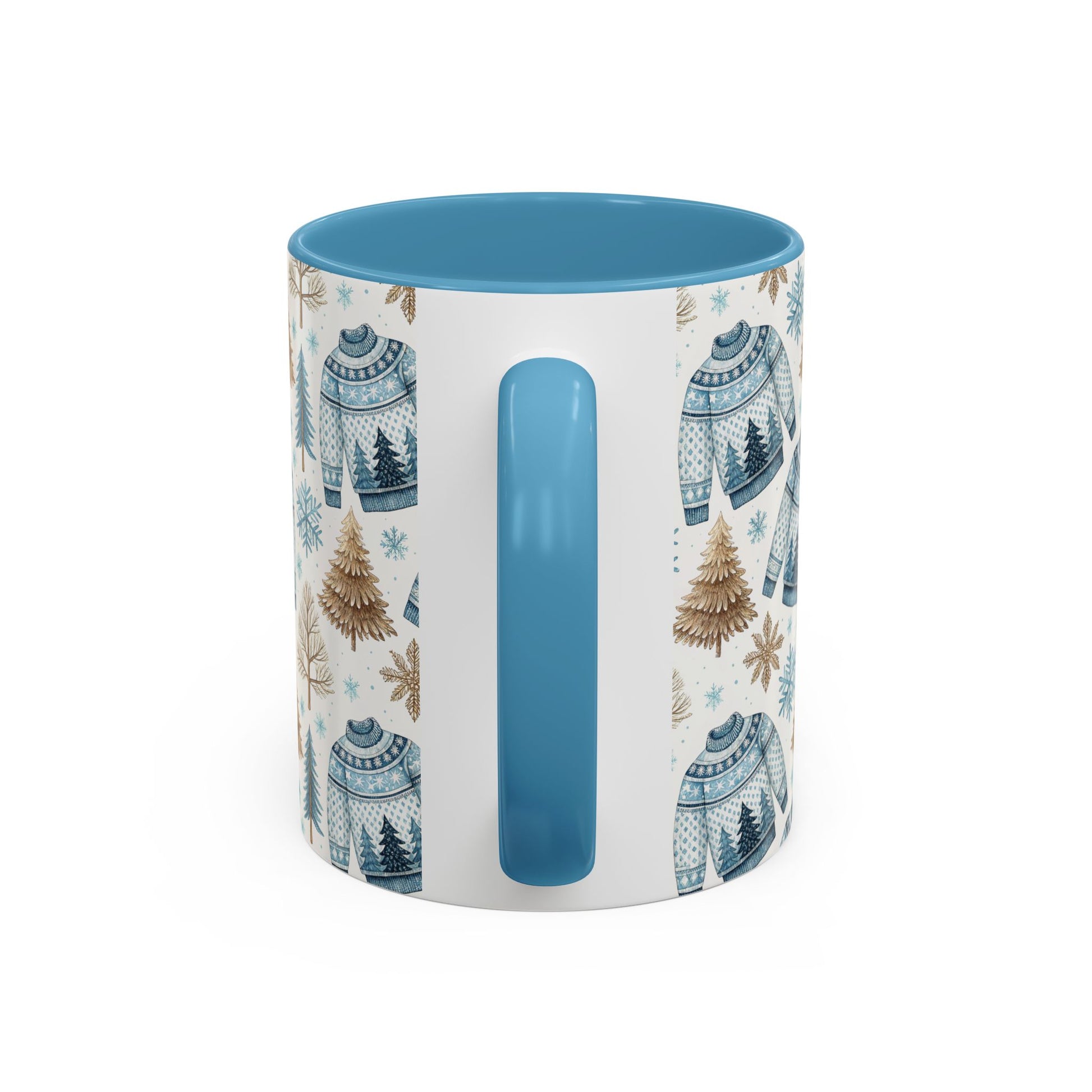 Nordic Winter Fair Isle sweater mug with blue handle and interior, featuring watercolor snowflakes and evergreens.