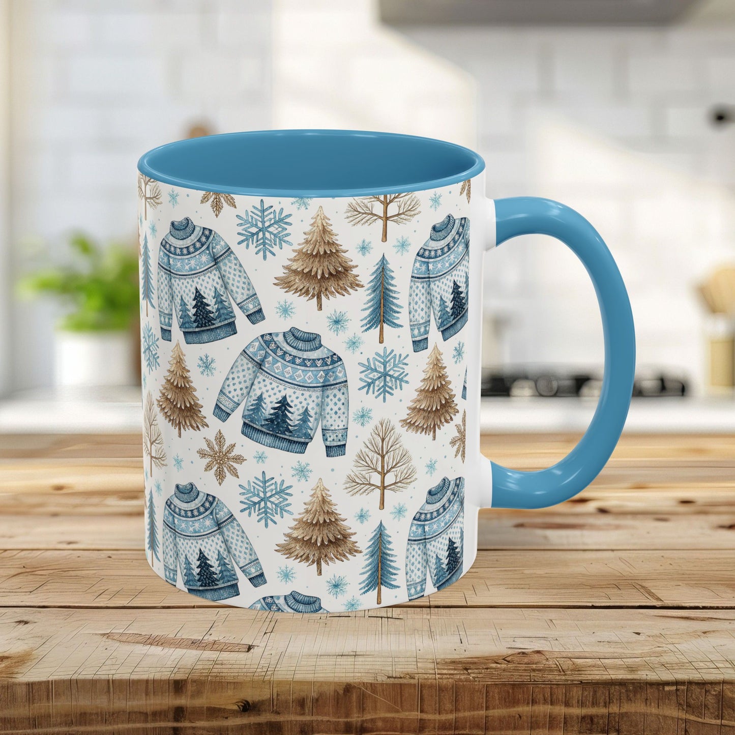 11oz Nordic Winter Fair Isle mug with blue handle & interior, featuring watercolor sweaters, snowflakes, and evergreens.