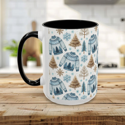 White ceramic mug with black handle and interior, featuring a watercolor Nordic fair isle sweater and evergreen pattern.