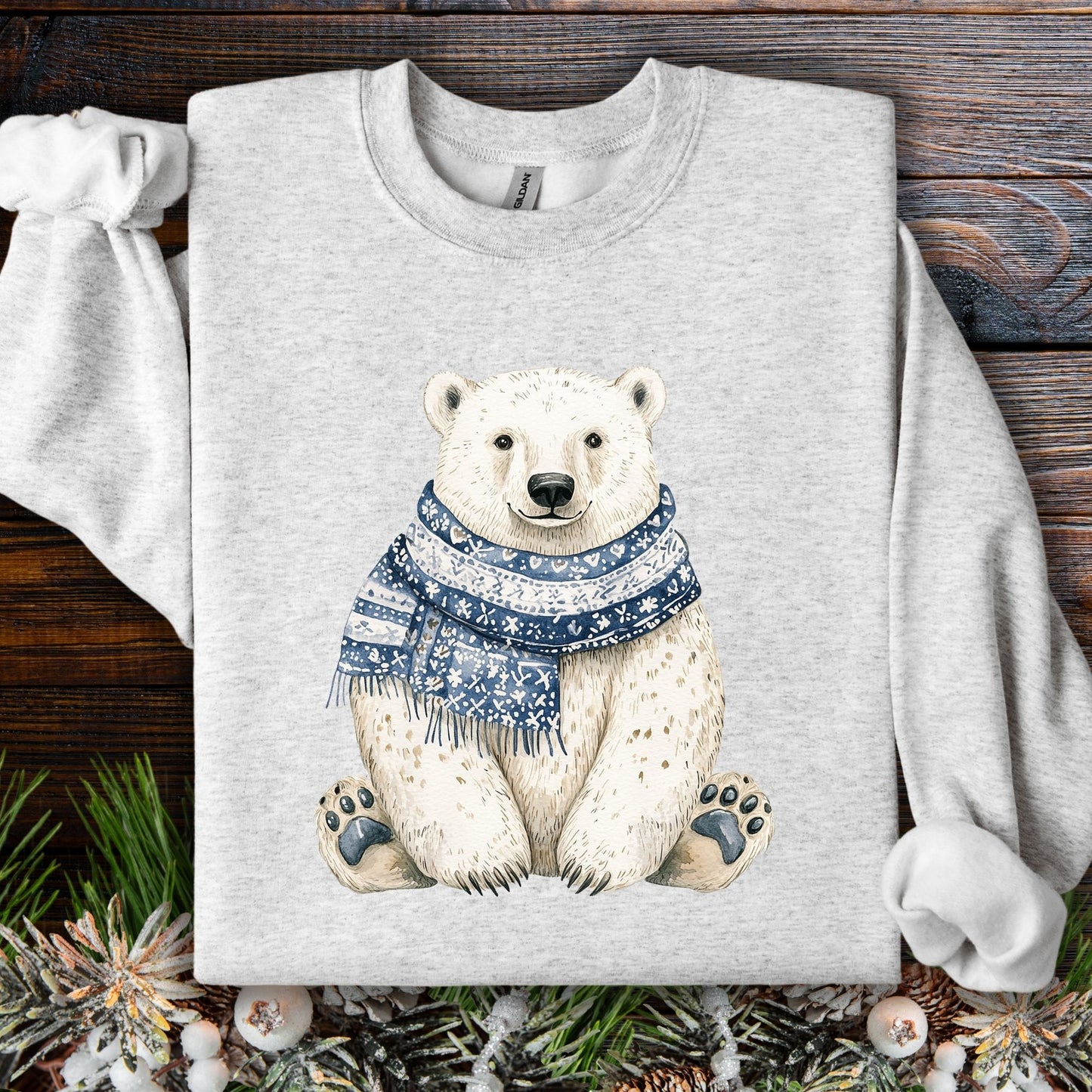 Light gray Nordic Winter Polar Bear Sweatshirt with a sitting bear wearing a blue patterned scarf.
