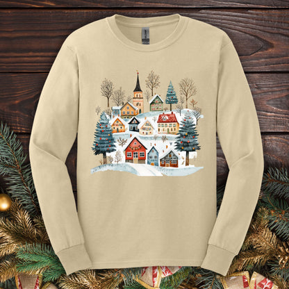 Sand Gildan Softstyle long sleeve tee with a watercolor Nordic winter village design.