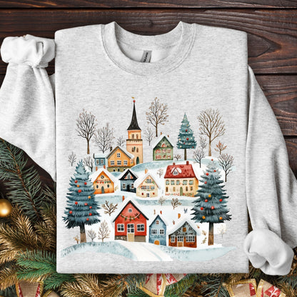 Ash gray unisex sweatshirt with a folk-art Nordic winter village design and Christmas trees.