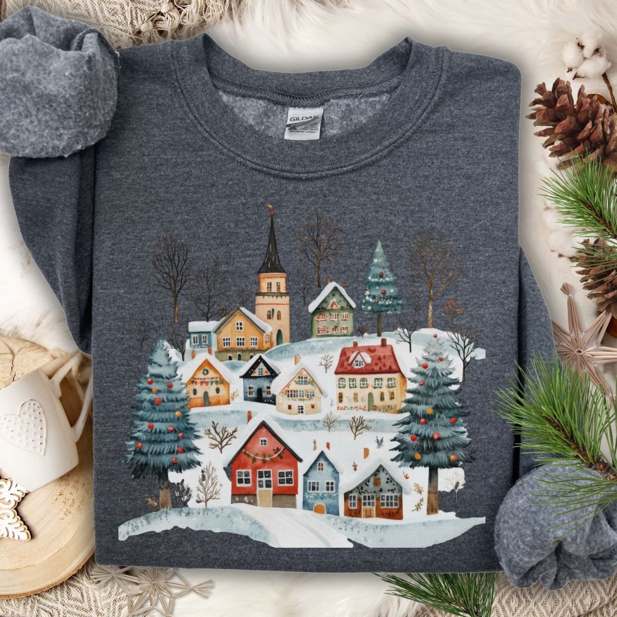Dark Heather Nordic Winter Village Sweatshirt with folk-art snow scene, cozy cotton-poly blend.