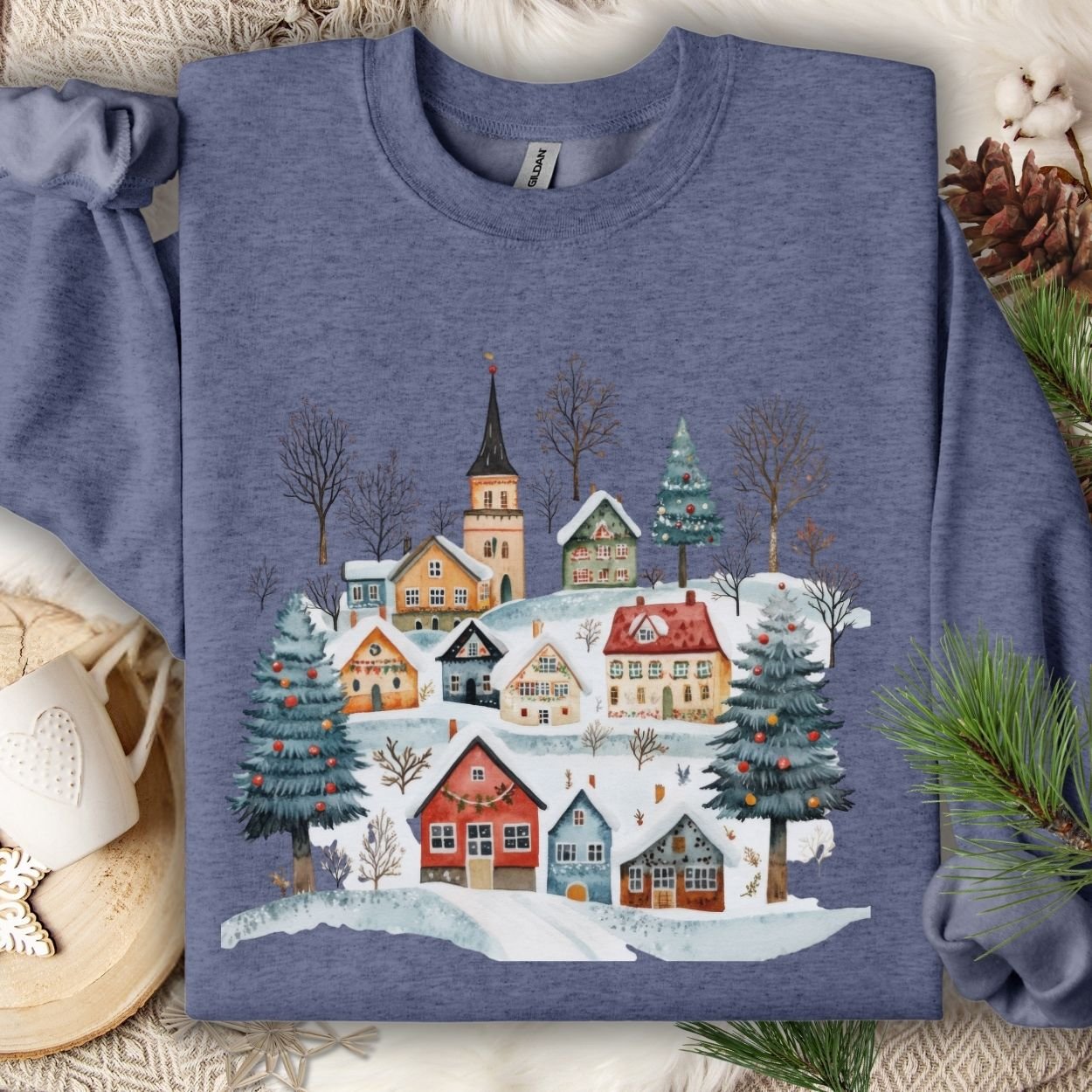 Heather Sport Dark Navy Nordic Winter Village Sweatshirt with folk-art cottages, trees, and snow.