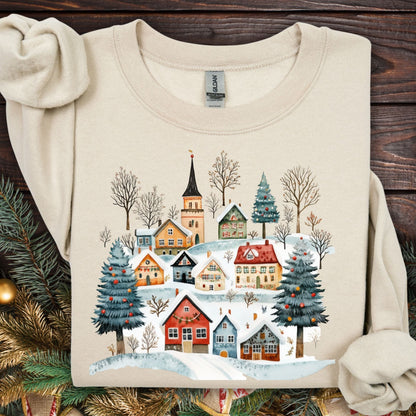 Sand Nordic Winter Village Sweatshirt, S, featuring folk-art cottages, snowy trees, and a church.