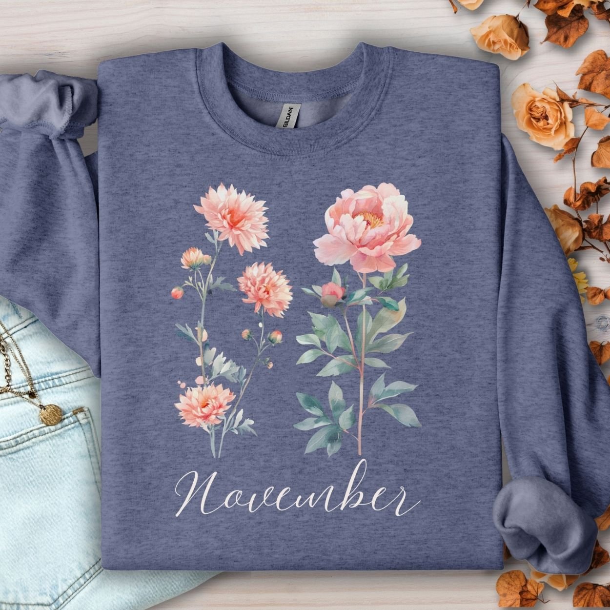 Heather Sport Dark Navy sweatshirt with watercolor chrysanthemum and peony flowers, "November" script, and autumn leaves.