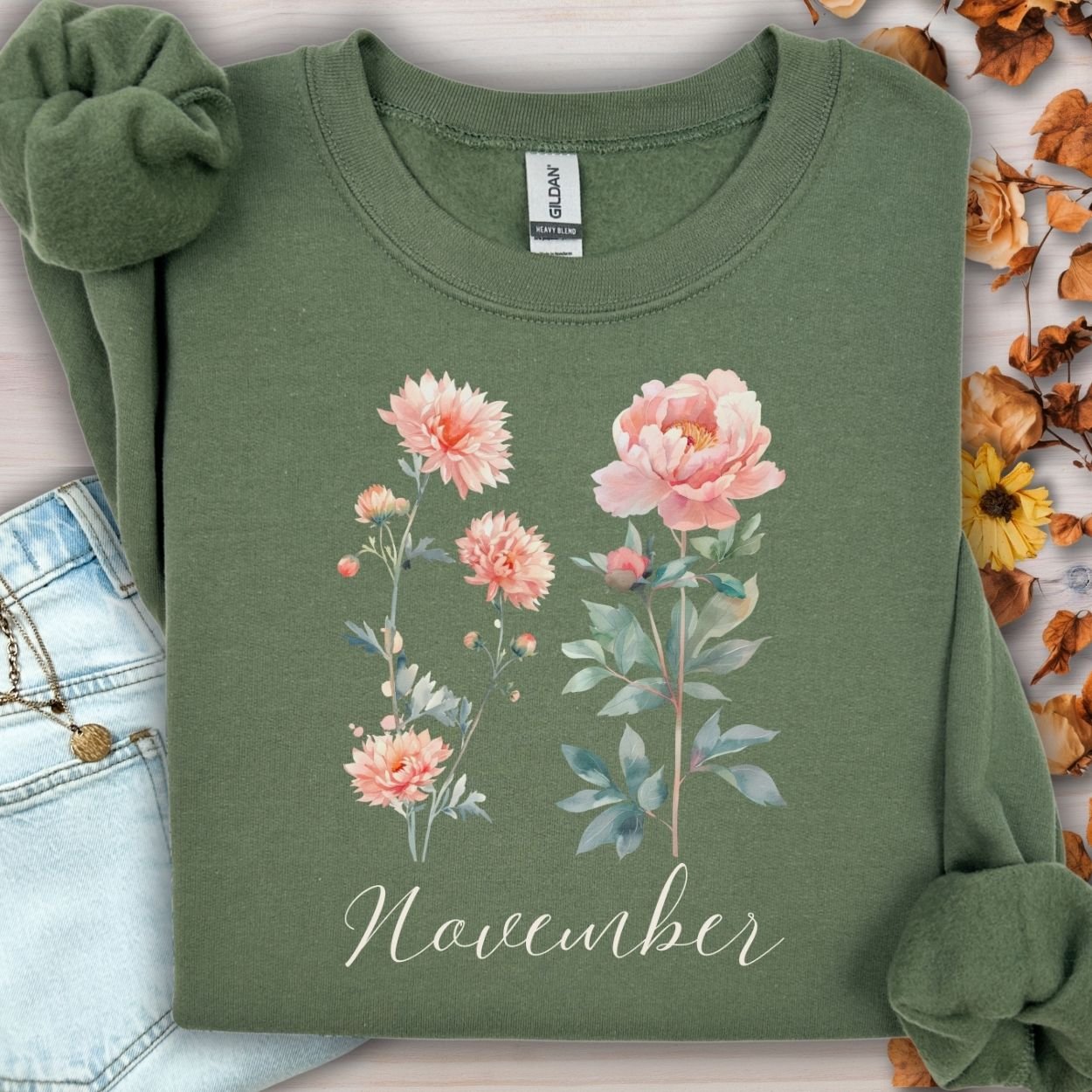 Military Green unisex sweatshirt with watercolor chrysanthemum and peony flowers, plus "November" text.