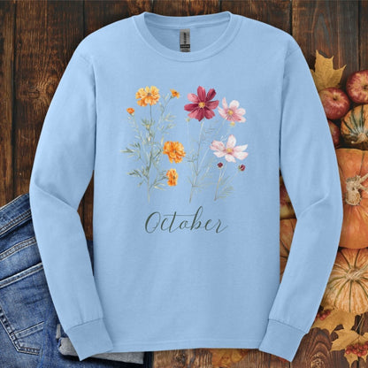 Light blue long sleeve tee with watercolor marigold and cosmos flowers and "October" text.