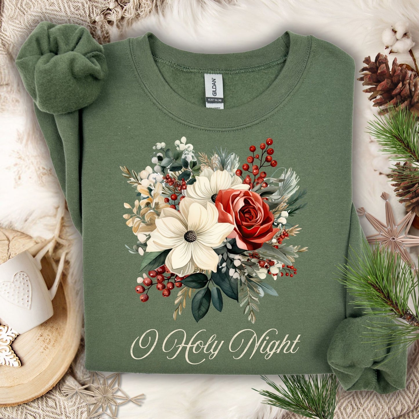 Military green Gildan sweatshirt with vintage poinsettia, rose, and berry bouquet, plus "O Holy Night" text.