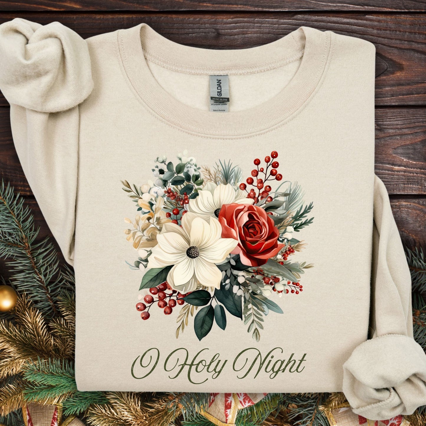 Sand Gildan sweatshirt with vintage poinsettia, rose, and berry bouquet, plus "O Holy Night" text.