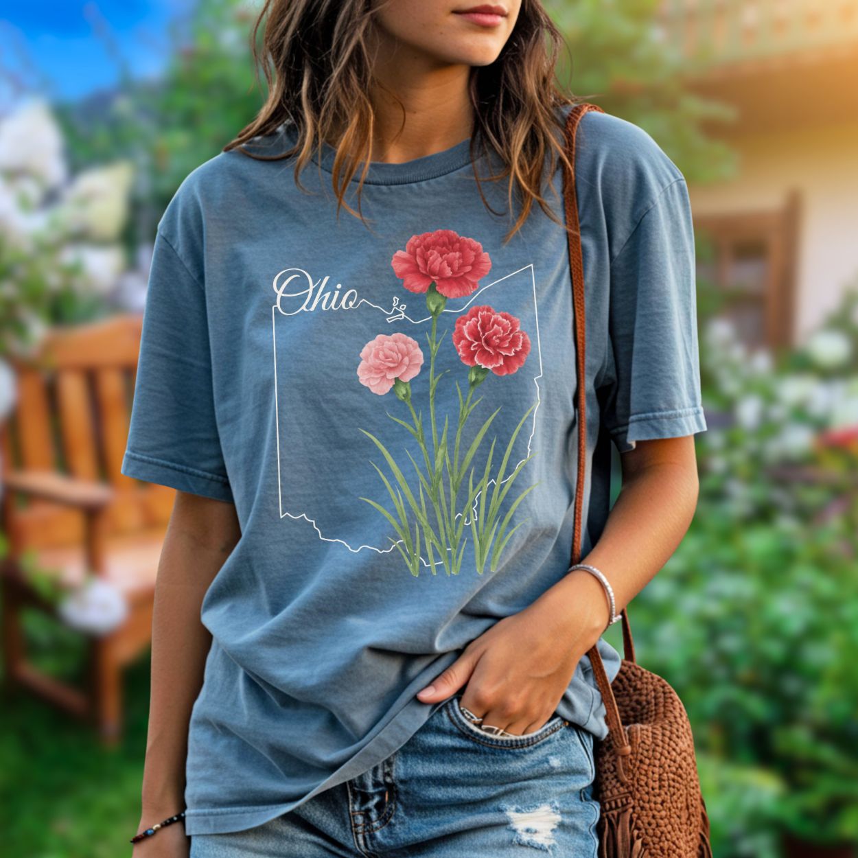 Garment-dyed blue t-shirt with a relaxed fit, featuring a white Ohio outline and red and pink carnation illustration.
