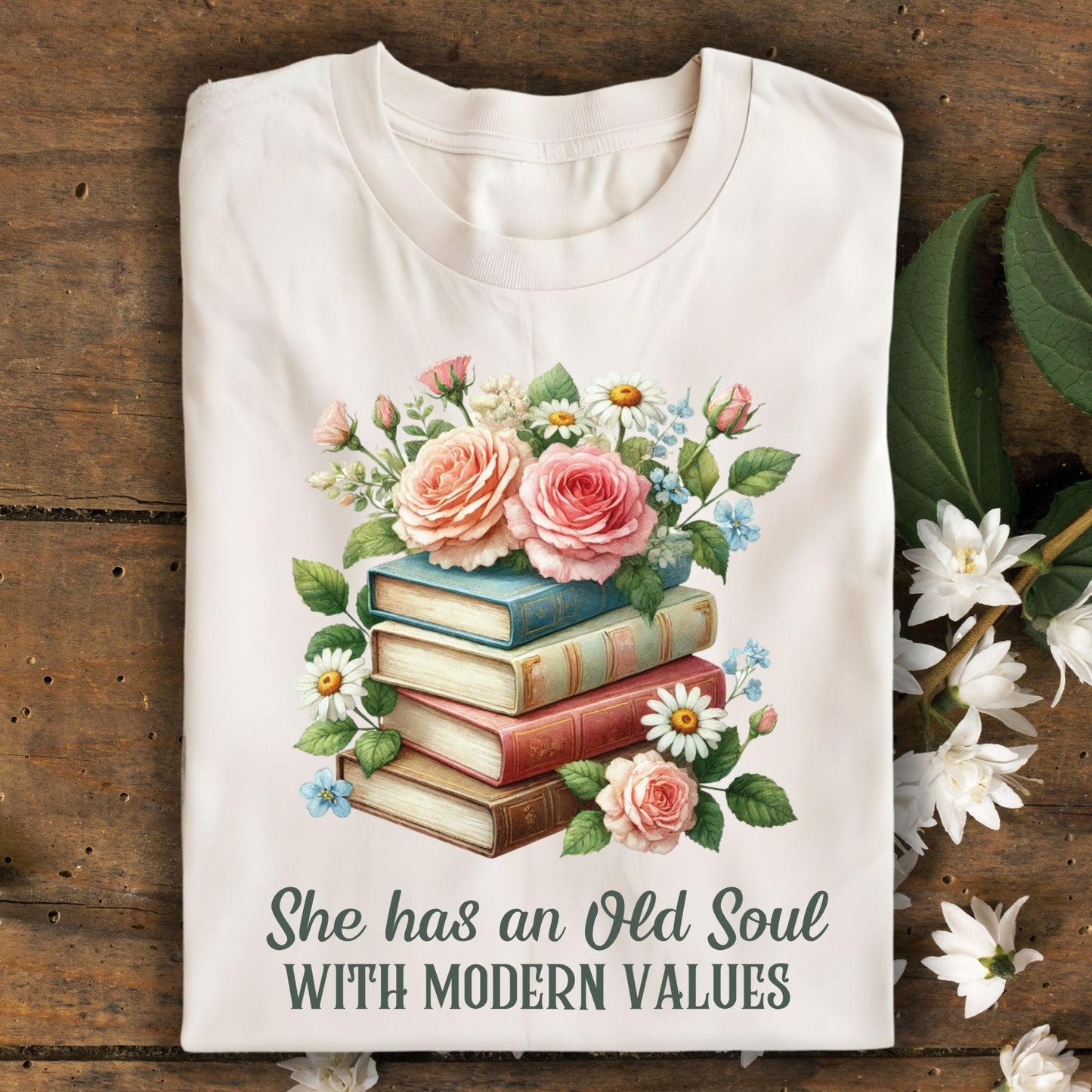 Natural S t-shirt with watercolor books, pink roses, daisies, and "She has an Old Soul WITH MODERN VALUES" text.