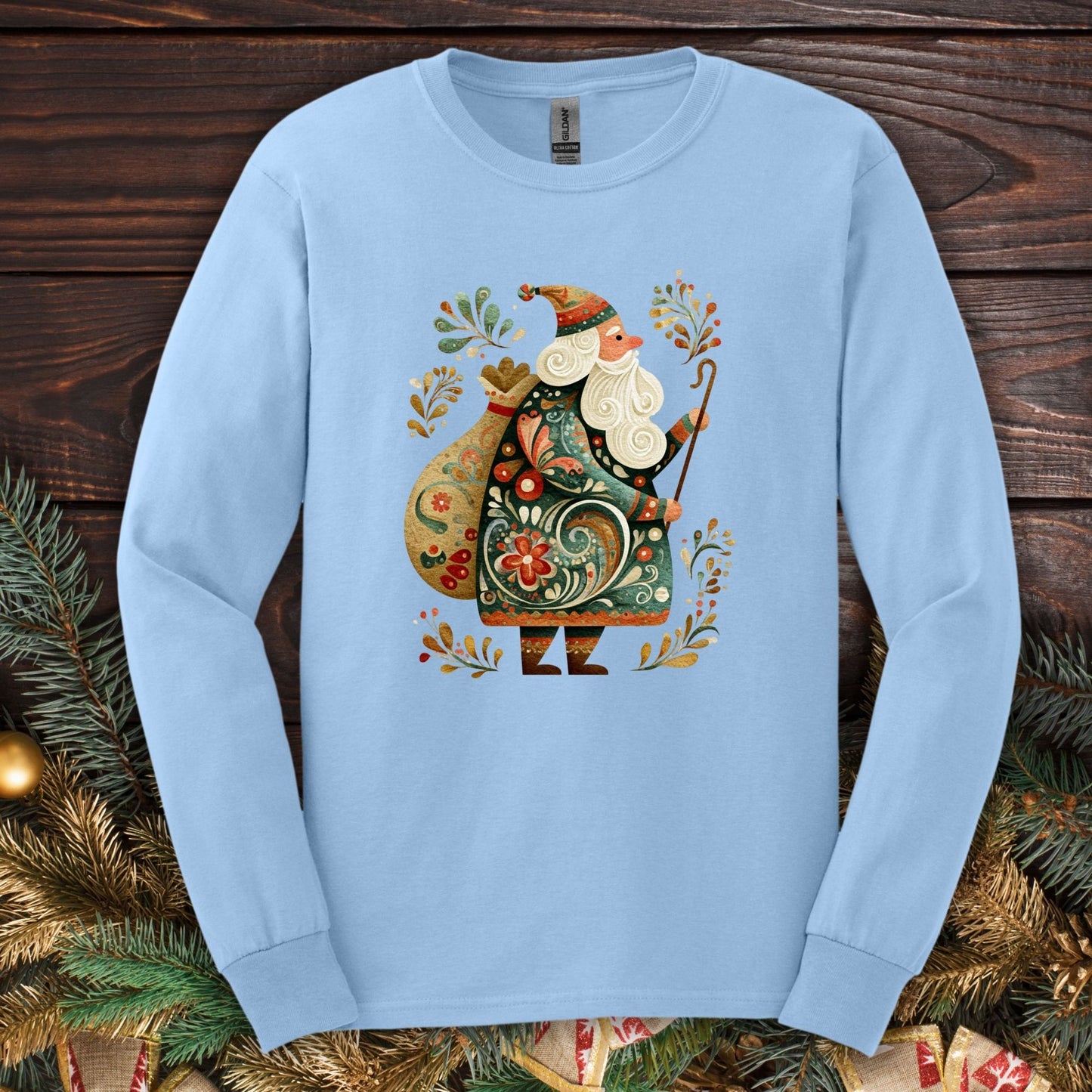 Light blue Gildan long sleeve tee with ornate Old World St. Nicholas Eastern European folk art design.
