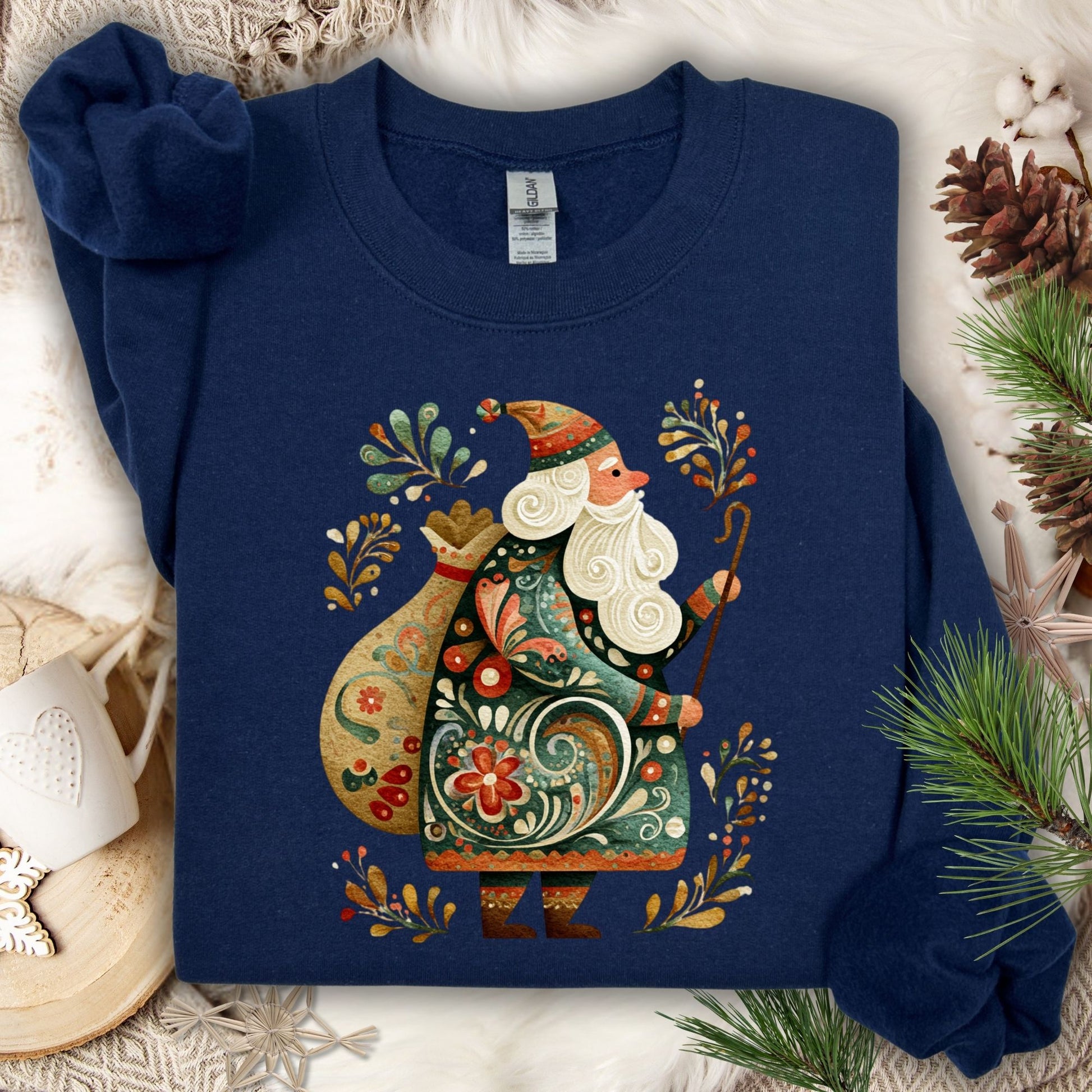 Navy Gildan sweatshirt with a colorful folk art St. Nicholas design, surrounded by festive patterns.