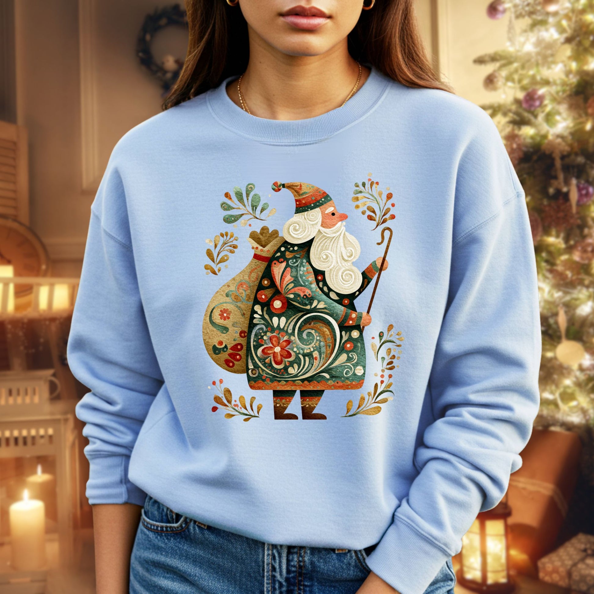 Light blue sweatshirt with a colorful folk art St. Nicholas design, featuring festive patterns and vintage hues.
