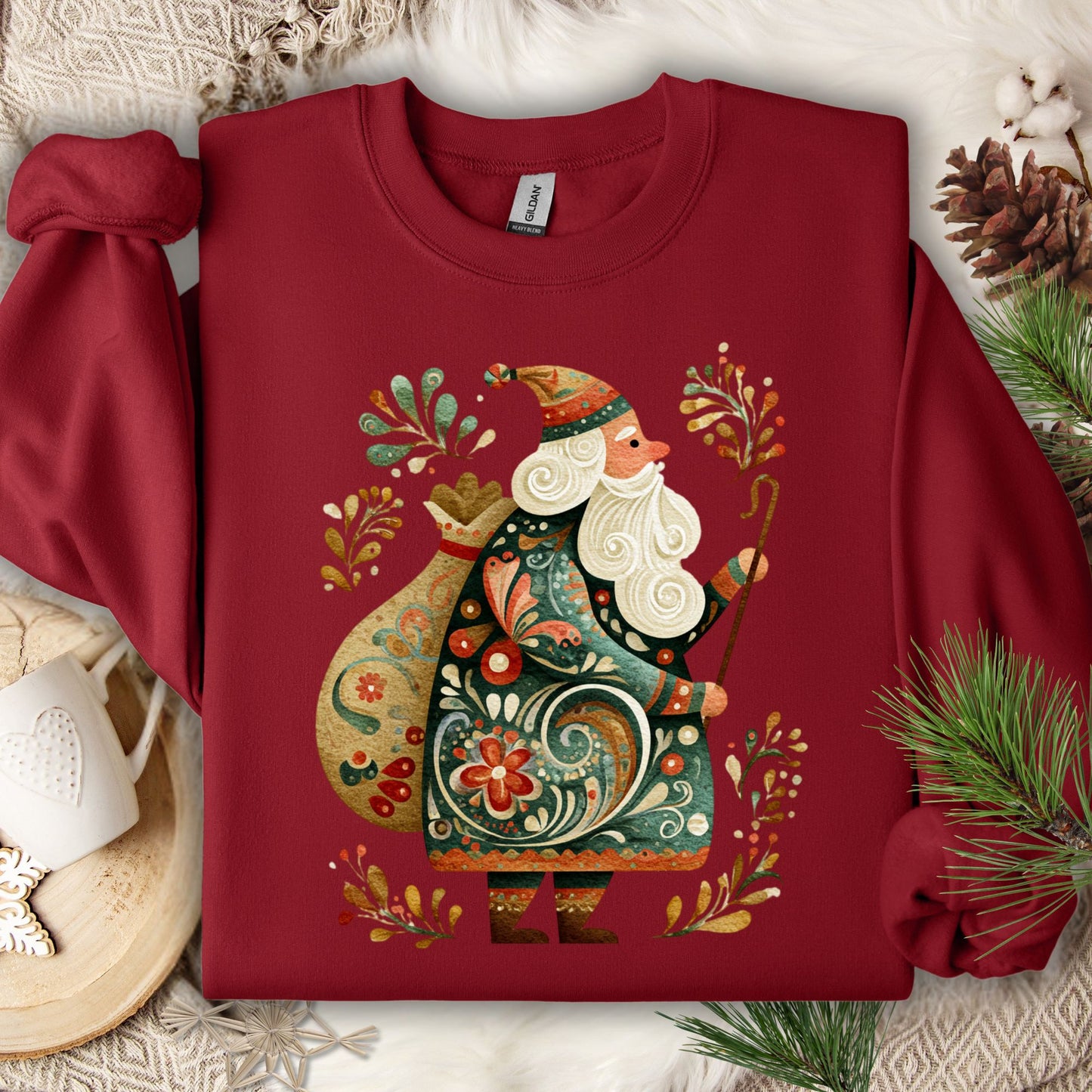 Cardinal Red Gildan sweatshirt with a colorful folk art St. Nicholas design and festive patterns.