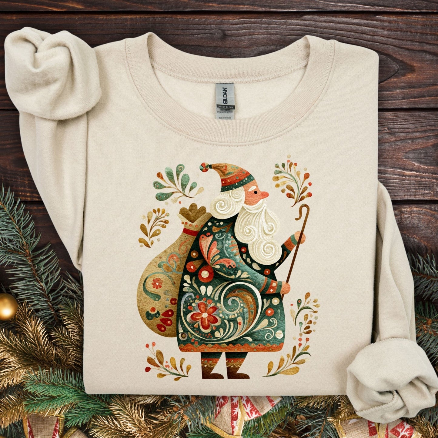 Sand Gildan sweatshirt with a colorful folk art St. Nicholas design and festive patterns.