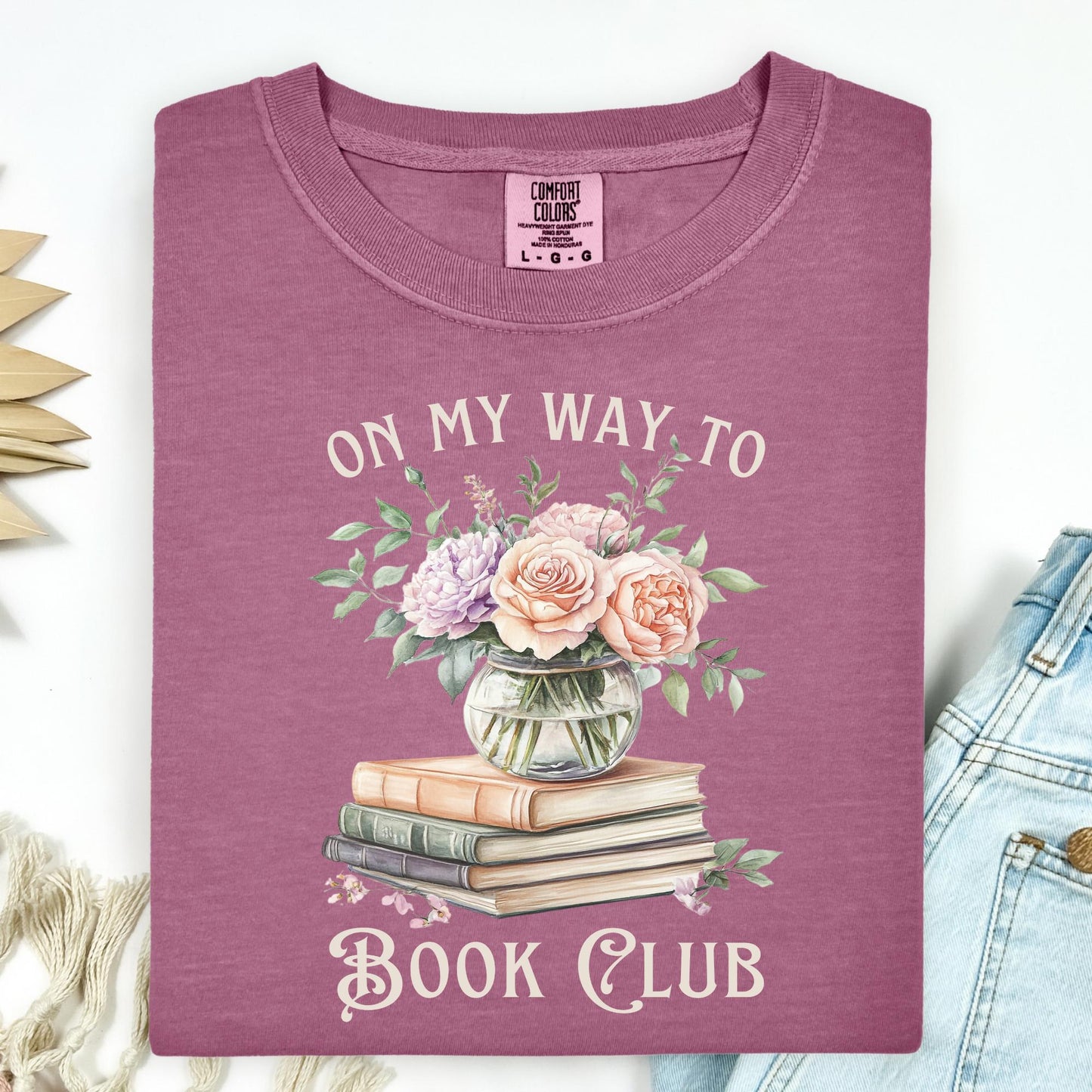 Berry Comfort Colors tee with "On My Way To Book Club" text, watercolor books, and a vase of flowers.