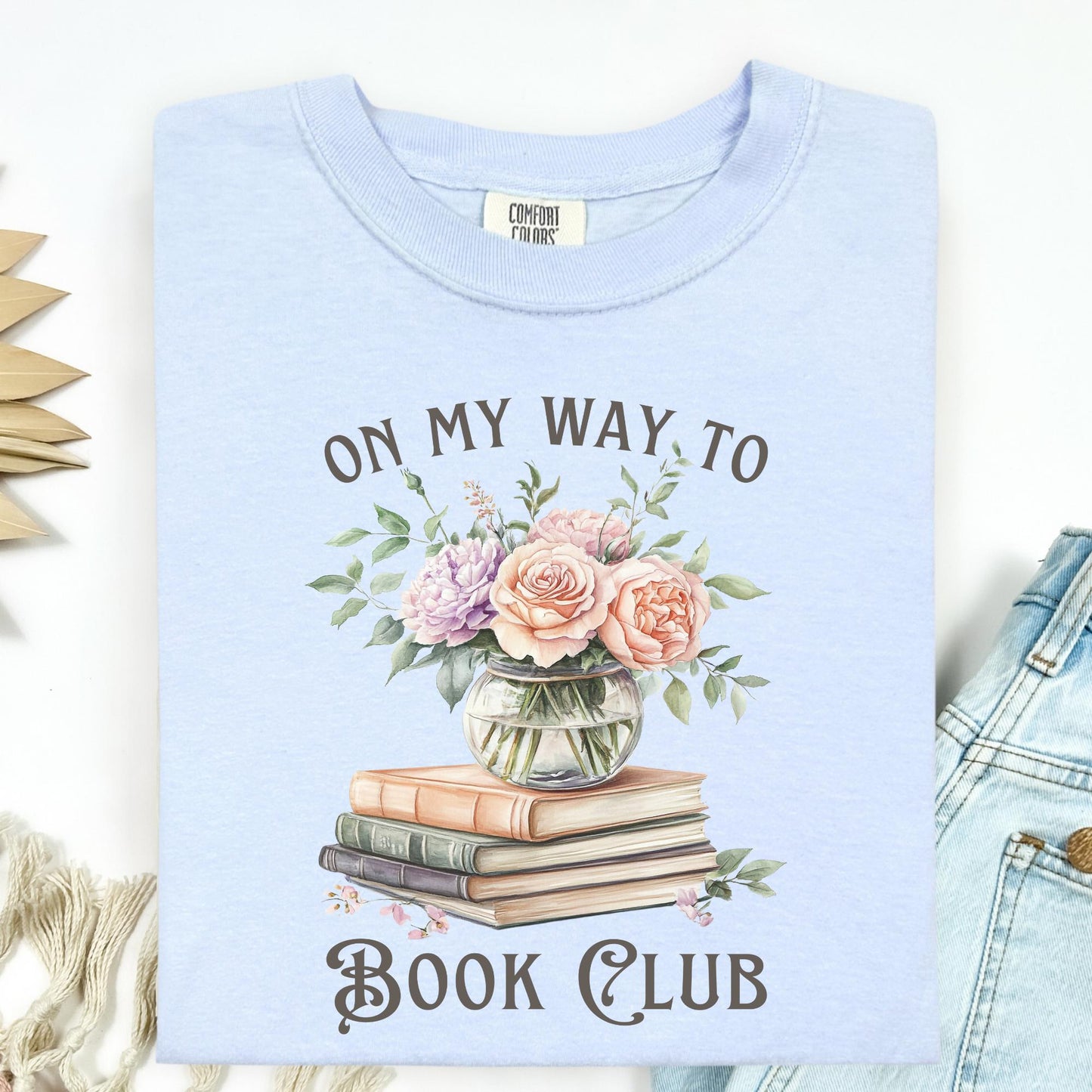 Hydrangea blue Comfort Colors tee with "On My Way To Book Club" text and watercolor vintage books with a vase of blooms.