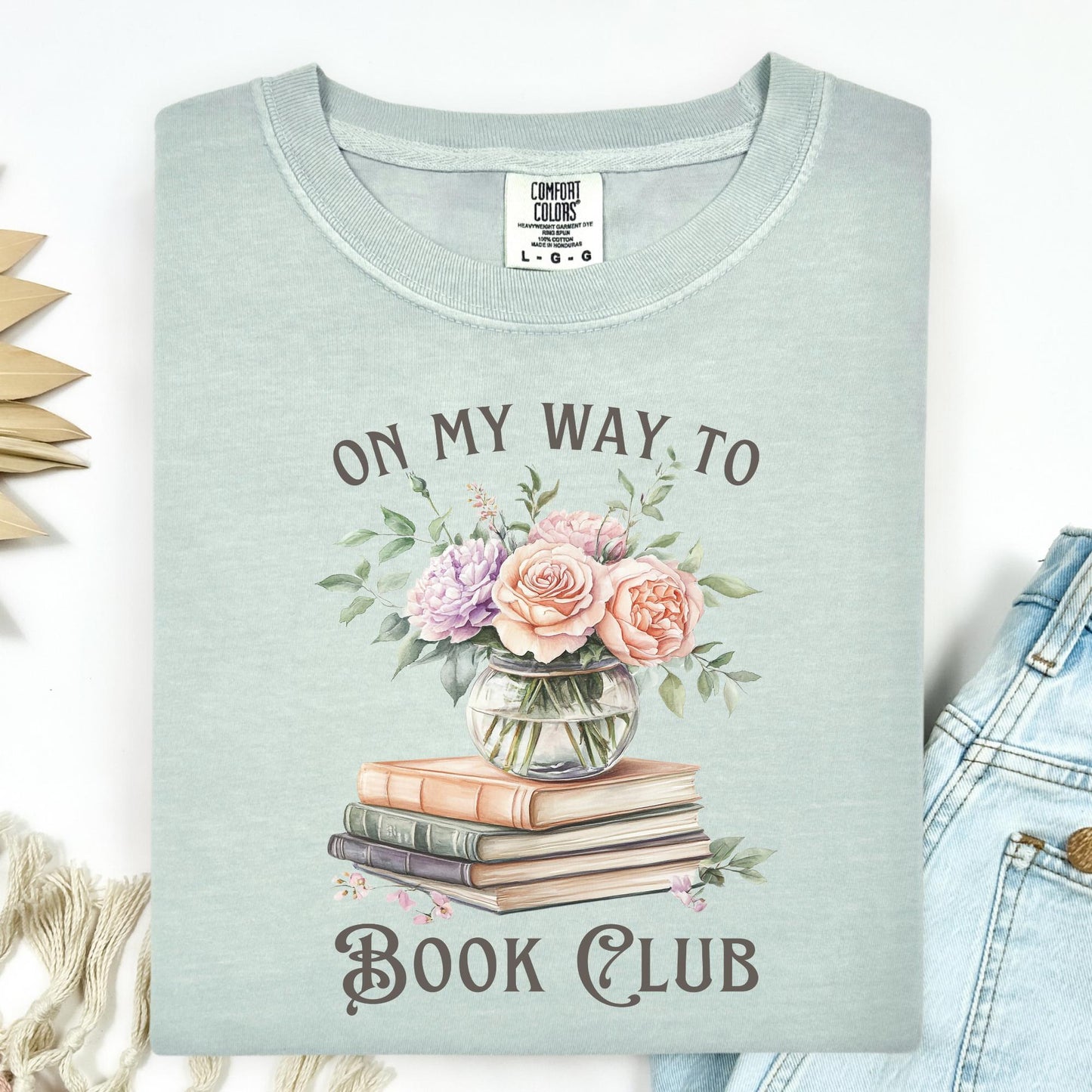 Bay Comfort Colors tee with "On My Way To Book Club" text, watercolor vintage books, and a vase of pink flowers.