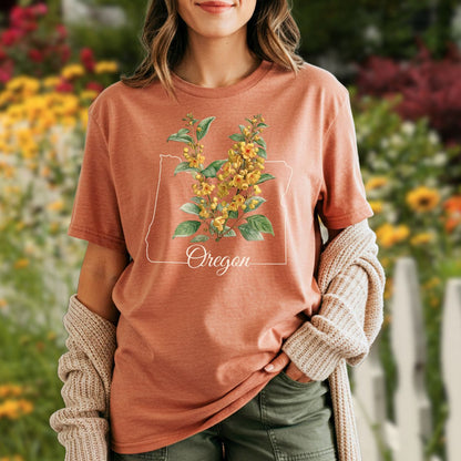 Relaxed-fit, garment-dyed t-shirt in rust with an Oregon outline and yellow Oregon Grape Blossom design.