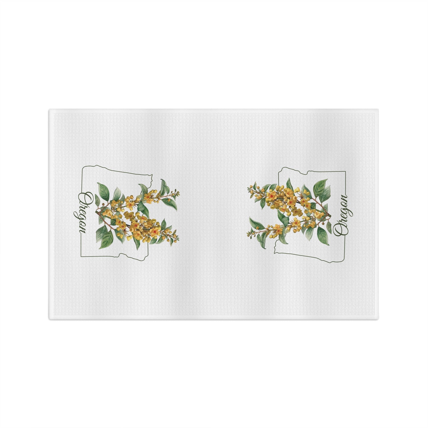 White microfiber tea towel with two Oregon state outlines filled with golden Oregon Grape blossoms.