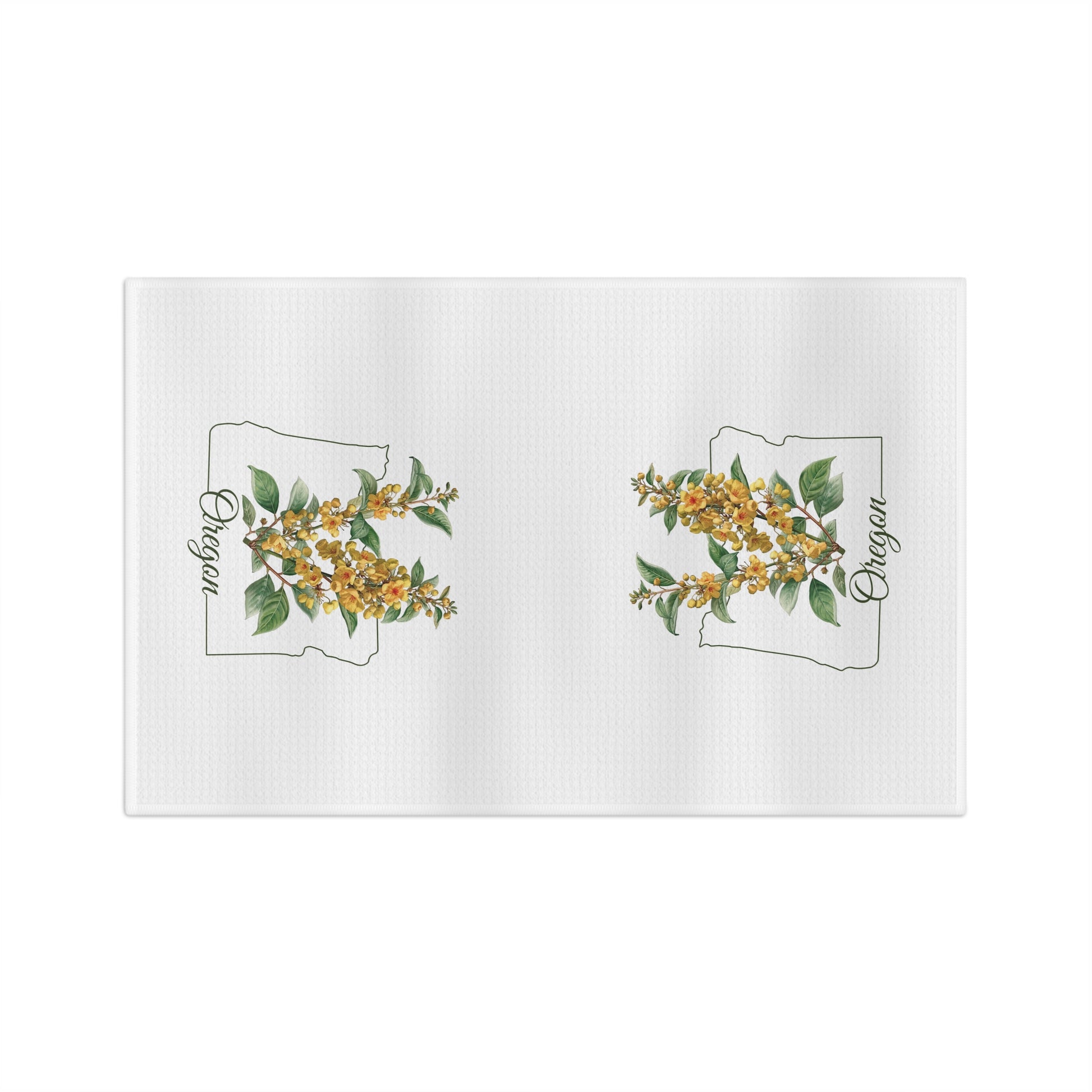 White microfiber tea towel with two Oregon state outlines filled with golden Oregon Grape blossoms.