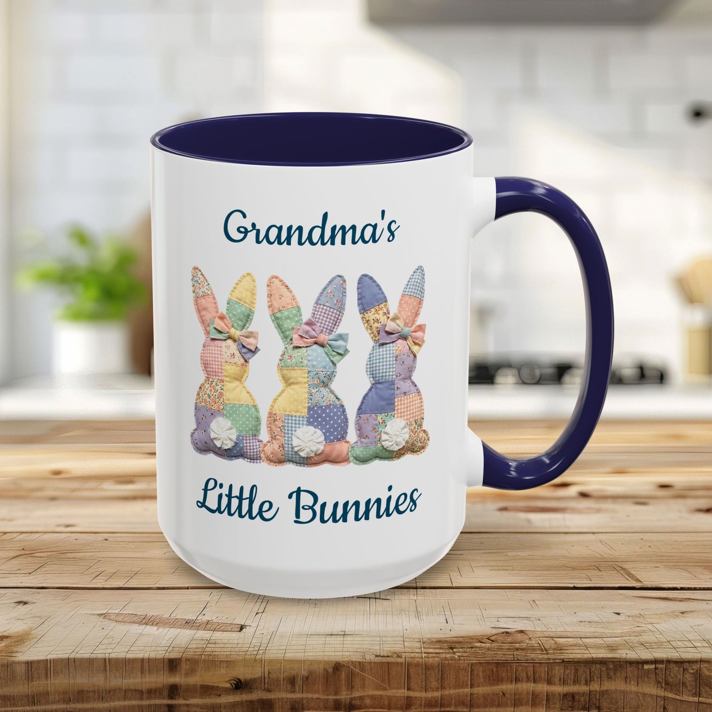 15oz ceramic mug with navy handle/interior, featuring "Grandma's Little Bunnies" and three patchwork bunnies.