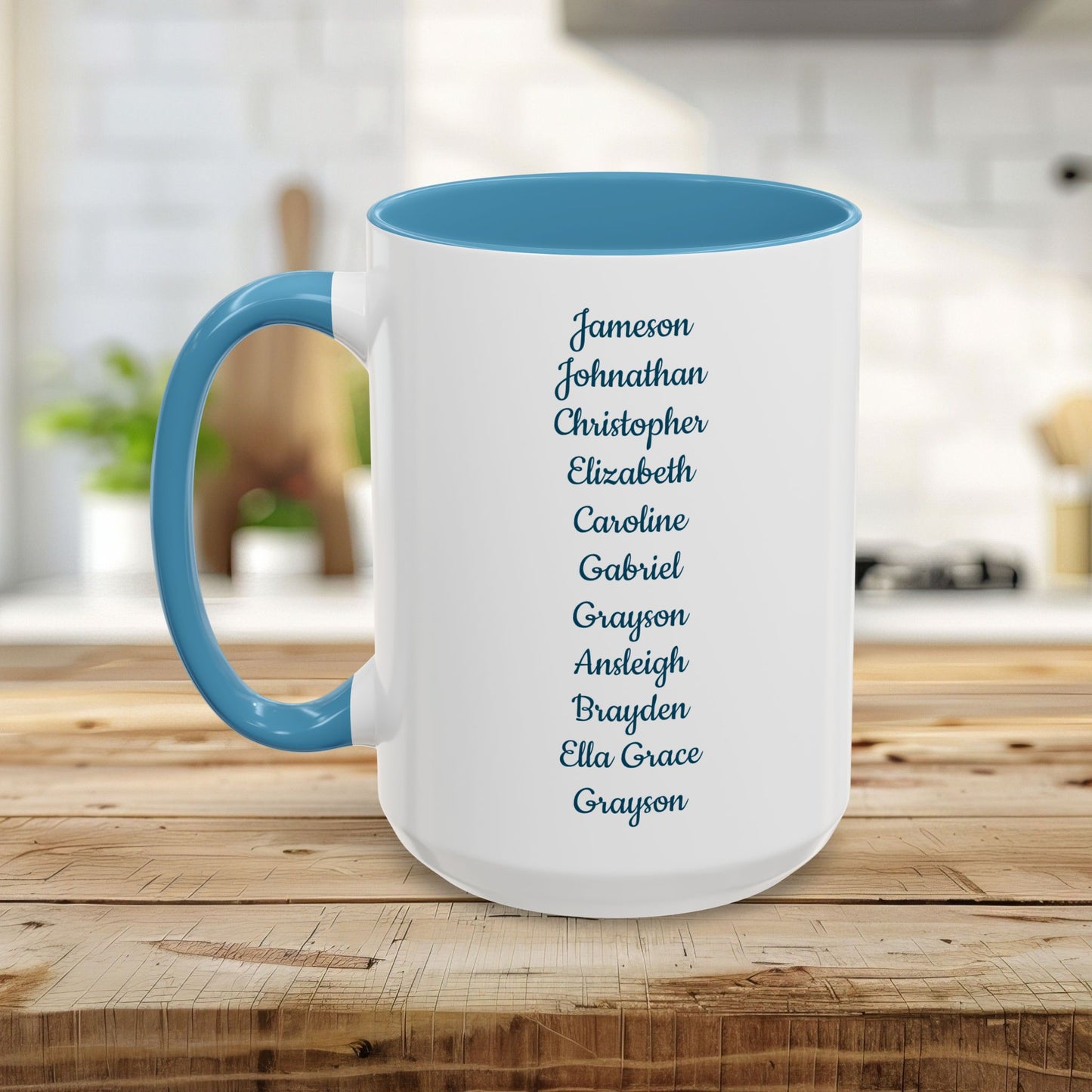 Personalized white ceramic mug with blue handle and interior, displaying a list of names.