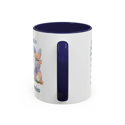 White ceramic mug with navy handle and interior, featuring "Grandma's Little Bunnies" and patchwork bunny design.