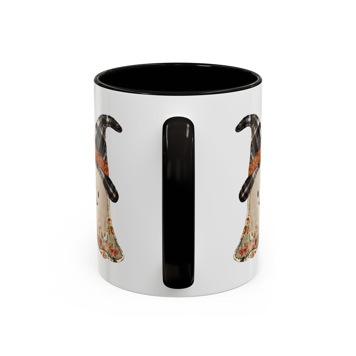 White ceramic mug with black handle and interior, featuring a patchwork ghost in a plaid witch hat.
