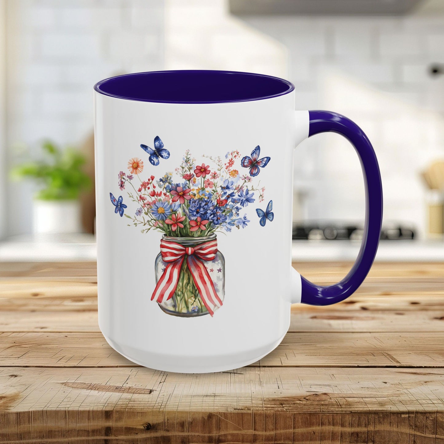 15oz white ceramic mug with blue interior/handle and a watercolor mason jar of patriotic flowers & butterflies.