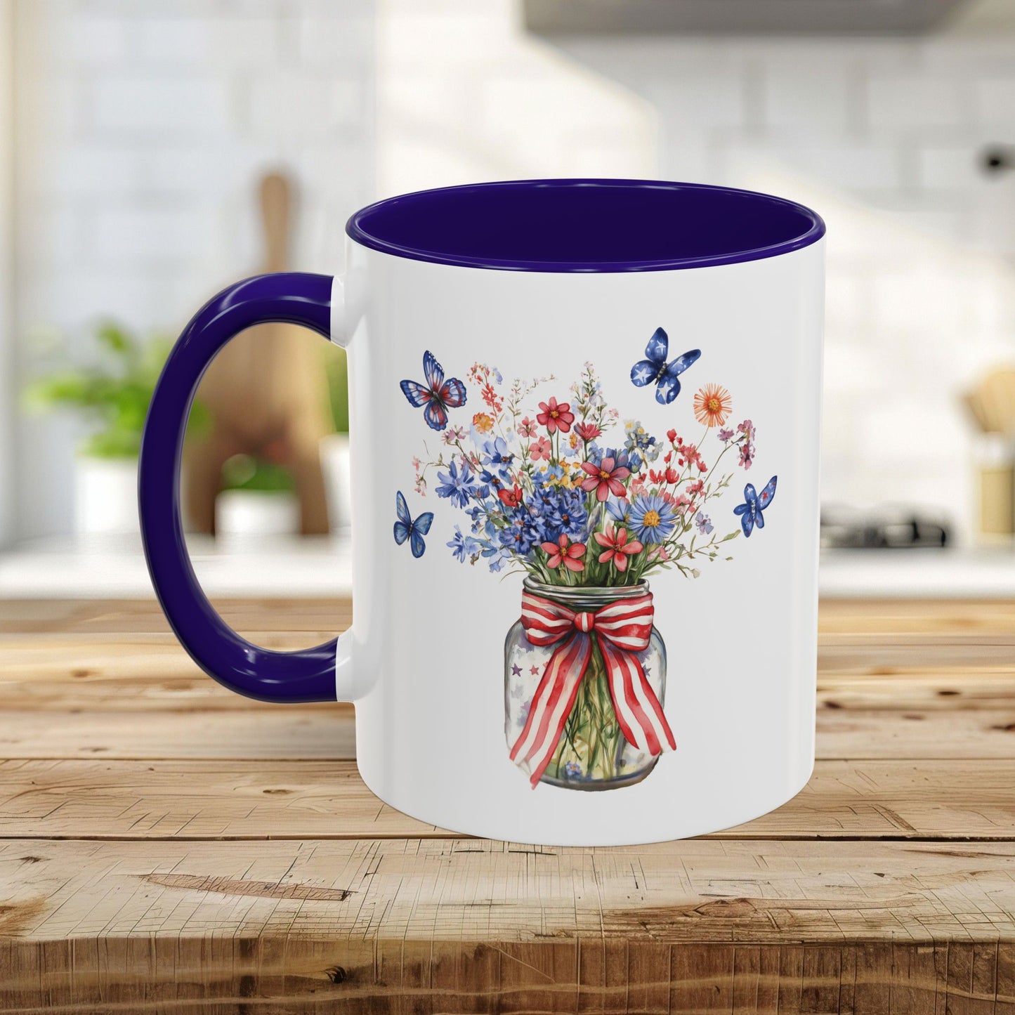 White ceramic mug with purple interior and handle, featuring a watercolor mason jar bouquet with patriotic flowers and butterflies.